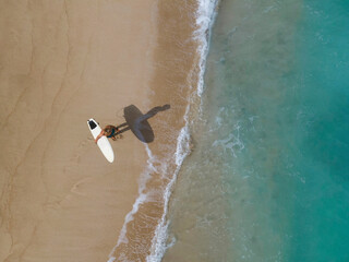 Aerial view of surfer at the beach