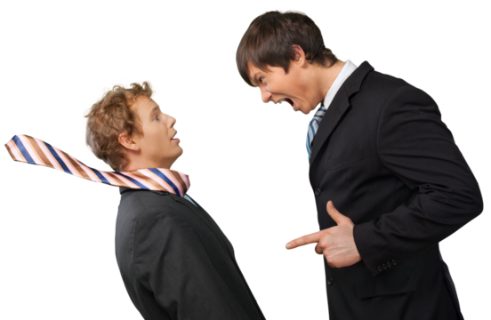 Young male businessman yelling at an employee
