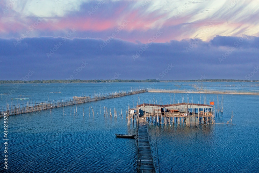 Wall mural picture over a shrimp farm in vietnam