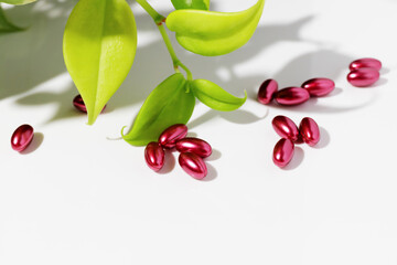 Many red pills on white background. Preparations for the treatment of colds, vitamins, wellness complex