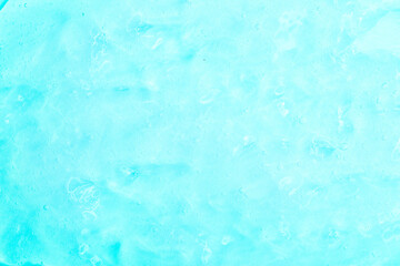 Cosmetic gel close-up with oxygen bubbles. Textured background with microbrushes in cosmetics. Moisturizing skin serum with vitamins and collagen.