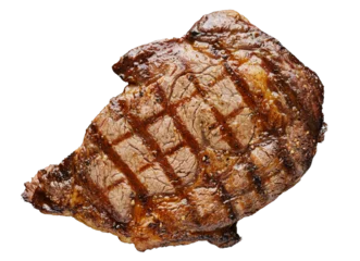 Foto op Plexiglas grilled ribeye steak on transparent background shot from overhead view  © Joshua Resnick