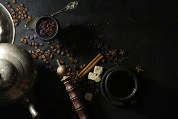 bowl with tobacco for hookah. shisha smoking. berries and fruits on a black background.