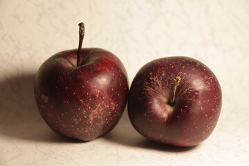 red apples on a wooden table