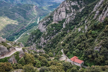 Aerial view with Sant Joan Funicular station near monastery Montserrat mountain range near...
