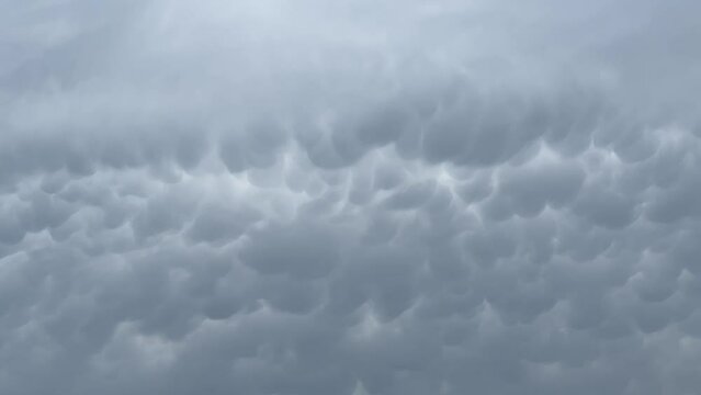 View of mammatus clouds on the sky in 4k