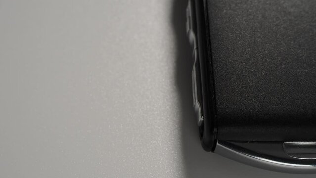 Modern wireless car key ignition on a white background. Car keys close-up.