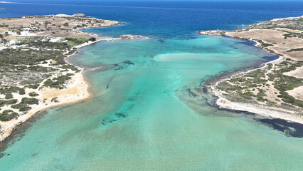 Fototapeta na wymiar Aerial drone photo of paradise turquoise coloured nudist beach near camping of Northern part of Antiparos island, Cyclades, Greece
