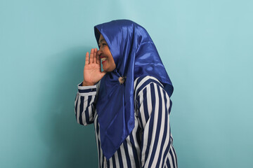 A middle-aged Asian woman in a blue hijab and striped shirt is whispering a secret and sharing...