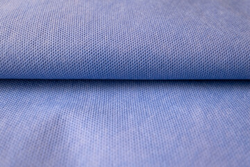 Blue texture. Medical texture. Blue background. Surgical drape.. Closeup Image Of Blue Drape Sheet...
