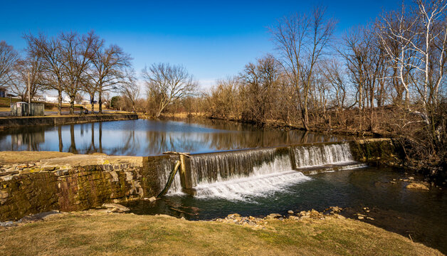 View of a Man Made Waterfall Dam for Operation of a Old Grist Mill for the Making of Flour