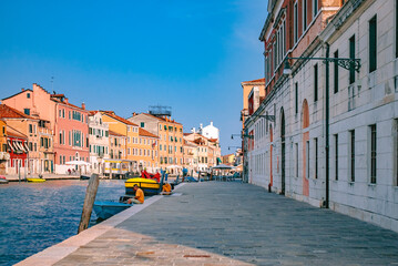 Italy, Venice - Jule 31, 2018: venetian canals in heat summer dayy - Filter applied in post-production by Yevheniy Myakiy