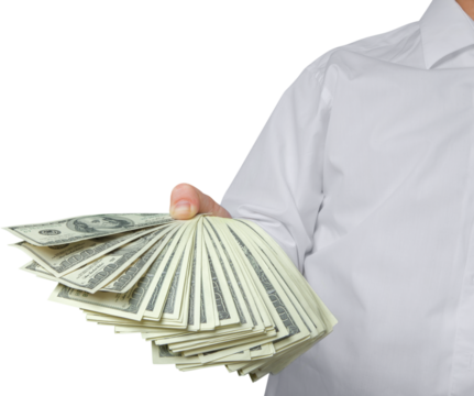 Human hand holds a stack Paper Currency