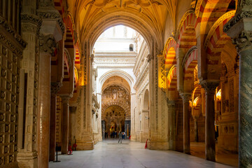 The ornate arched interior entry into the Great Mosque Cathedral Mezquita in the city of Cordoba,...