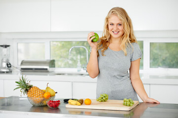 Fruits, apple or portrait of happy woman for healthy lunch or breakfast meal or diet in kitchen at home. Morning snack, smile or vegan girl eating fresh food to lose weight for wellness or gut health