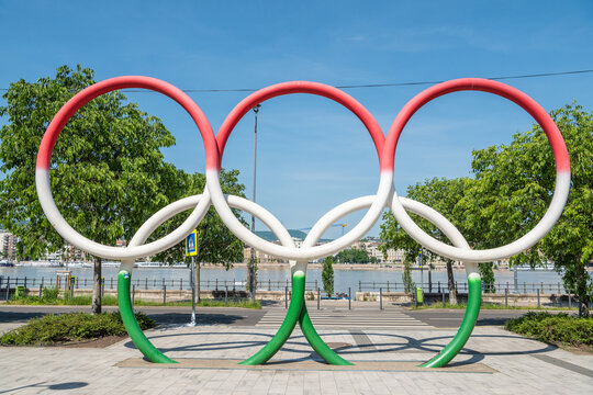 The Olympic rings, painted in the colours of the Hungarian national flag - red, white and green, in the Olimpia Park in Budapest, Hungary.