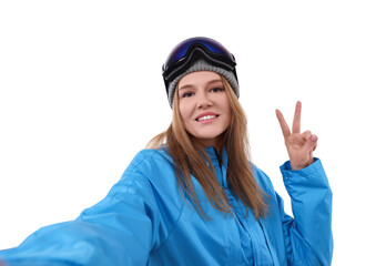 Beautiful woman in ski goggles taking selfie on white background
