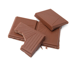 Broken milk chocolate bar on white background