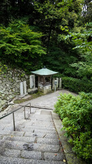 Stone steps leading to a shrine.