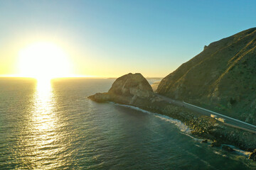 Sunset at Mugu Rock along the Pacific Coast Highway in Malibu, CA