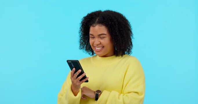 African woman, phone and texting in studio with smile, funny blog or meme with comic laugh by blue background. Girl, student and smartphone with chat, contact and comedy video on social network app