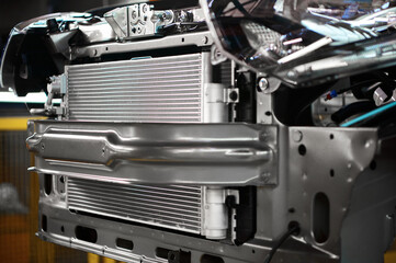 Automobile radiator prepared for installation in workshop