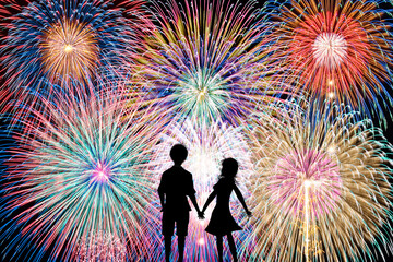 Fototapeta na wymiar Silhouette of a couple staring at fireworks. Fireworks date concept.