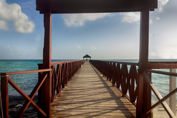 Fototapeta premium The pier that awaits the boats for tourists in the Caribbean