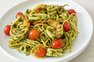 Spaghetti with seafood in homemade pesto sauce