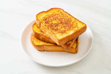 french toast on white plate