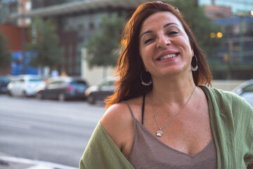 Confidence and Warmth: Charming Portrait of a Smiling Brunette Woman