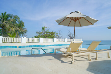 bed pool around swimming pool with sea background