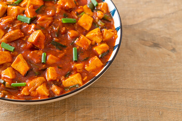 Mapo Tofu - The traditional Sichuan dish of silken tofu and ground beef, packed with mala flavor from chili oil and Sichuan peppercorns.