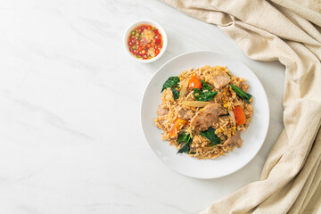 Fried rice with pork on plate