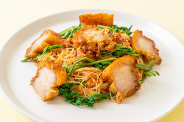 Stir-fried rice vermicelli and water mimosa with crispy pork belly