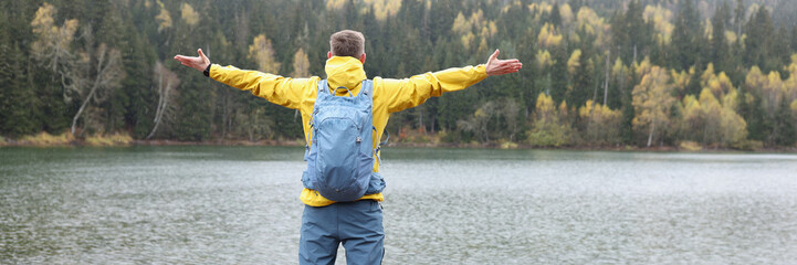 Male traveler rejoicing and enjoying nature back view © megaflopp