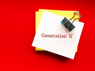 On red background, note paper with handwritten text GENERATION R , group of people who developed new skills and re-adjusted worldview during pandemic lockdown - more in control and resilient