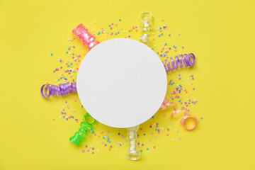Blank card with serpentine and confetti on yellow background