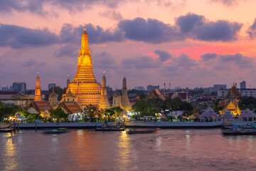 Wat Arun and the Chao Phraya River in twilight time.