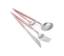 Stainless steel set of cutlery with pink handles on white background