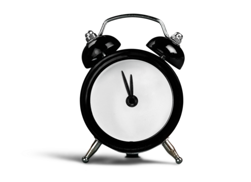 Black alarm clock on with number year. New year concept.