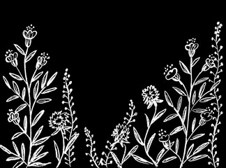 White decorative flowers on a black background - graphic image