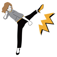 回し蹴りする女性