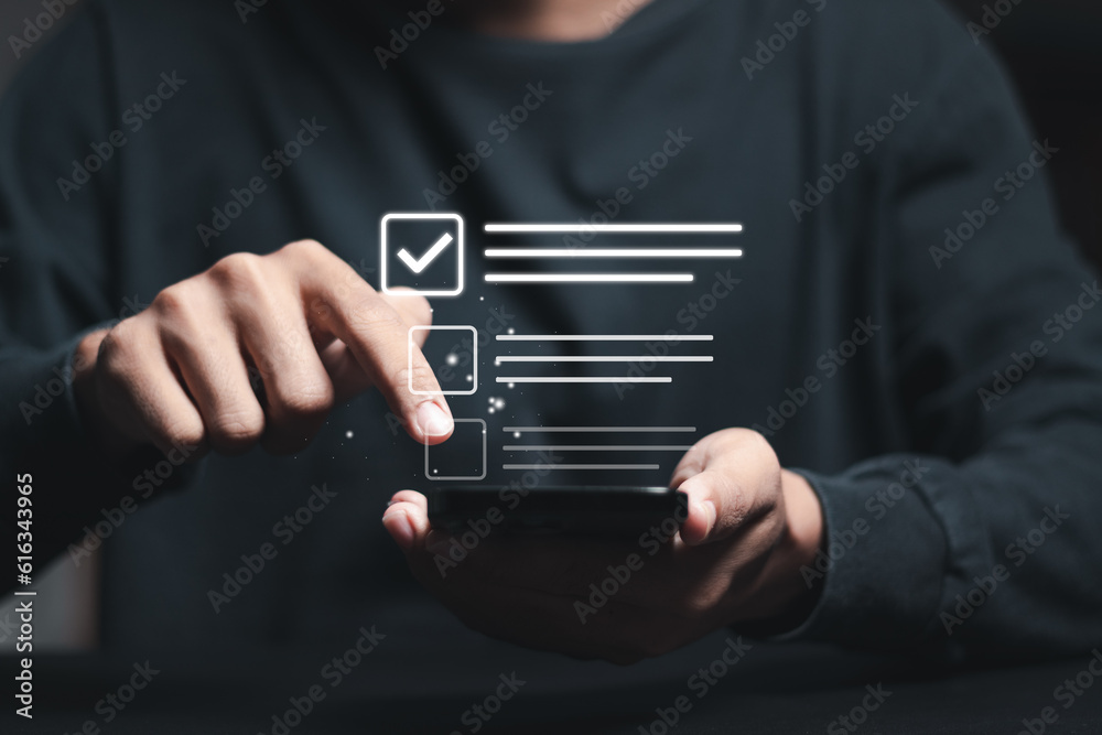 Wall mural businessman checking mark on checkboxes. checklist concept.