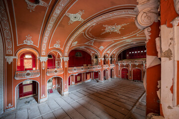 Obraz na płótnie Canvas Lost in Time: The Abandoned Red Theater of Hungary, a Haunting Relic in European History