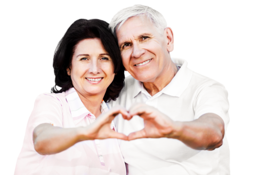 Portrait of happy senior couple showing heart sign