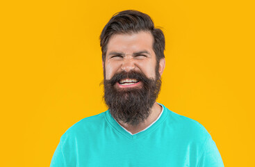 Fototapeta premium portrait of angry bearded man on background. portrait of bearded man.