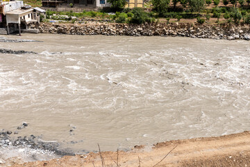 Aerial view of a flooding river swat from mountain top