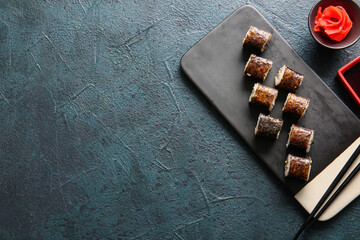Tasty maki rolls and ginger on dark background © Pixel-Shot