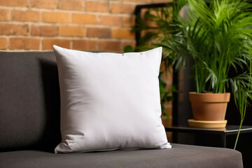 White square canvas pillow mockup on cozy sofa in living room interior, space for design presentation. Generative AI